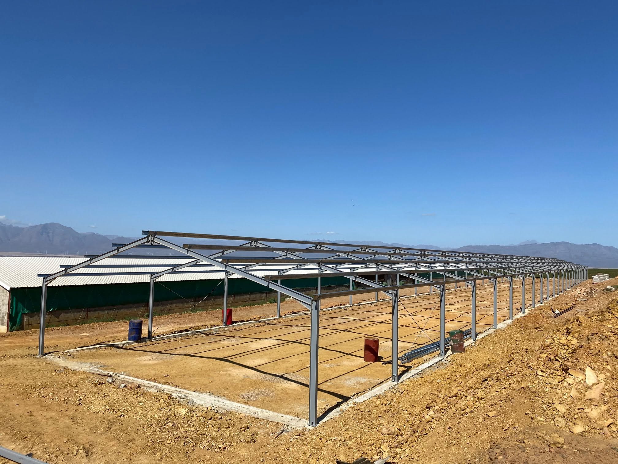 Steel-framed shed structure